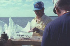 Brian Glenister supervising the sorting of samples